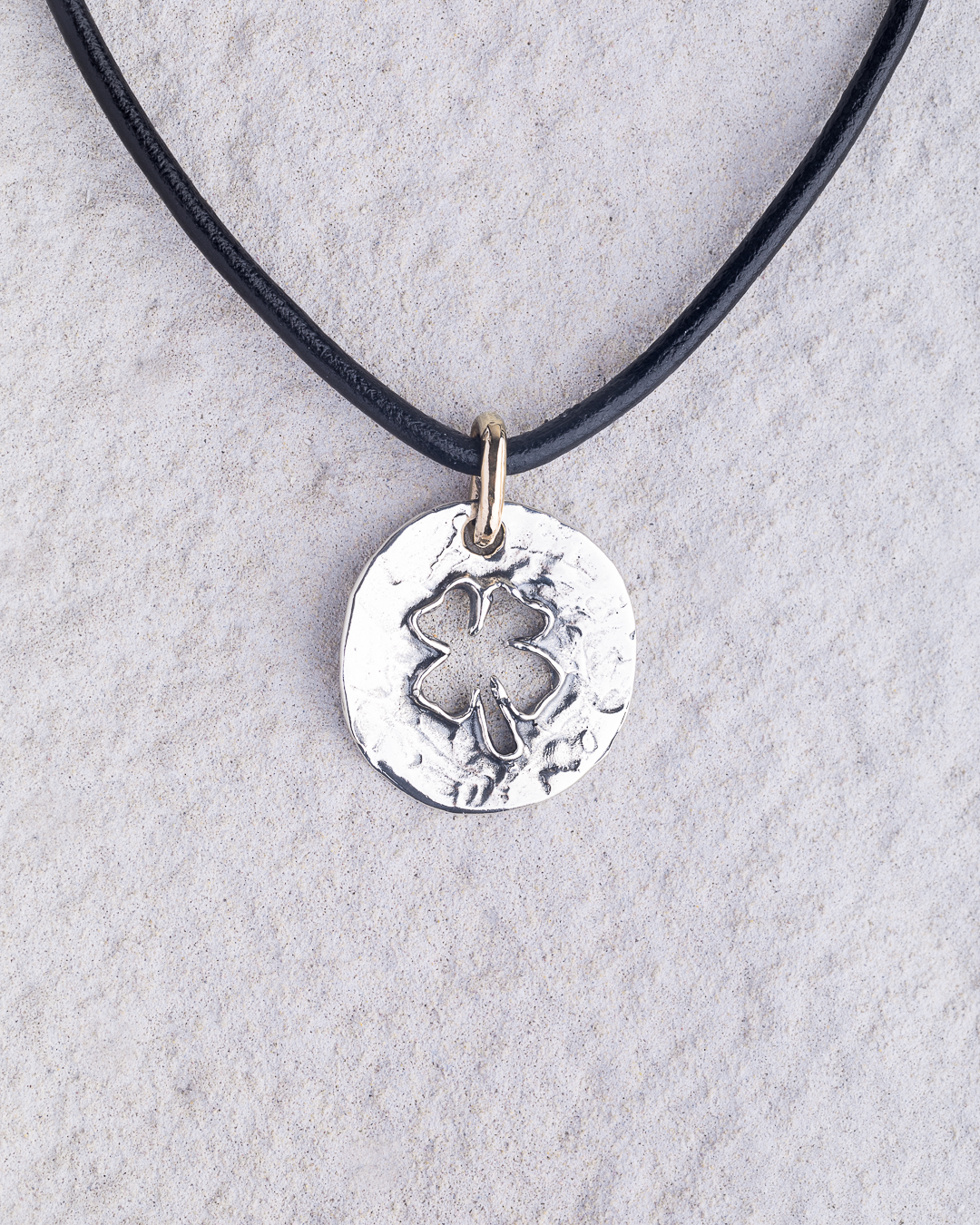 Ciondolo piastra Quadrifogli traforata argento